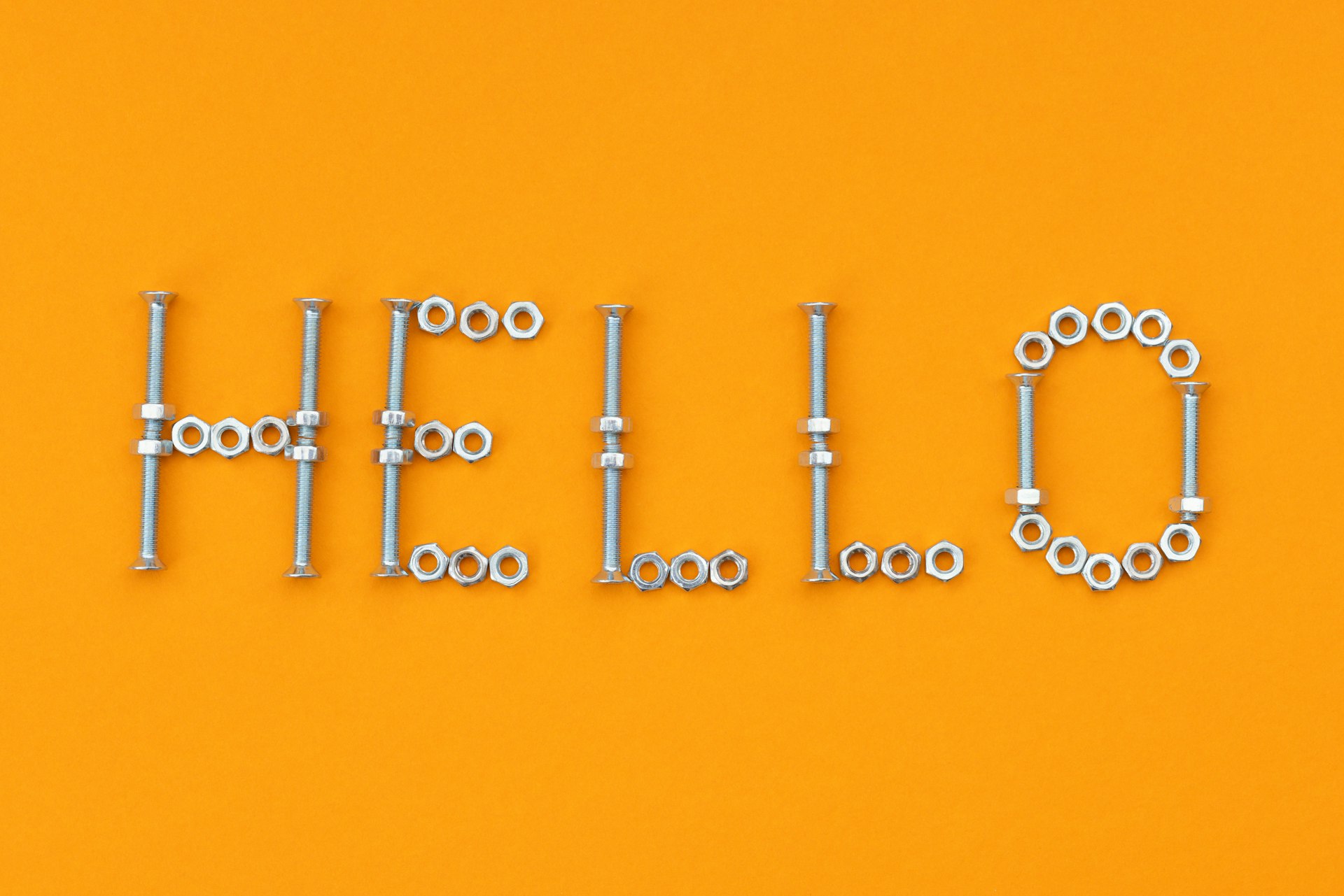 the word hello spelled out in metal parts